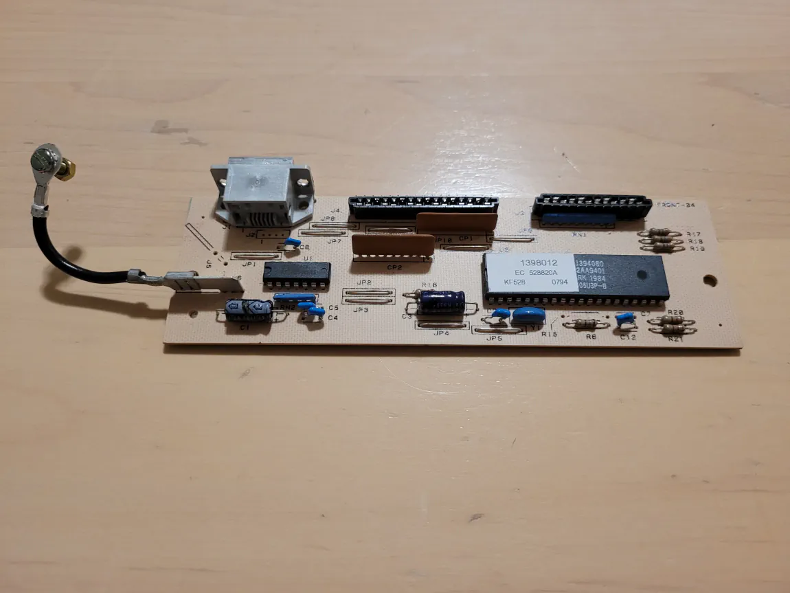 A closeup view of the PCB from the blue badge M101.