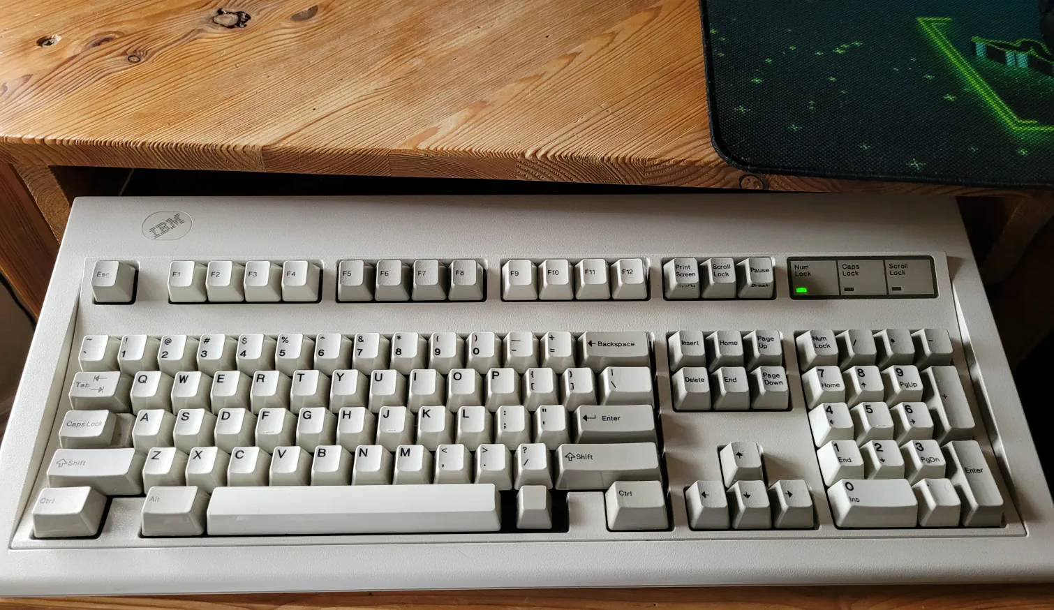 My grey badge M102 P/N 1391401 fully restored and at
my desk used as my daily driver.